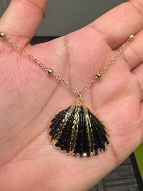 Natural black scallop shell pendant with gilded gold edges